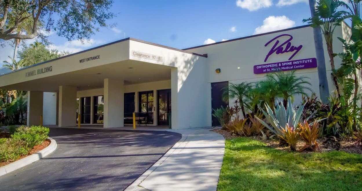 Entrance of the Paley Orthopedic & Spine Institute building, with the institute's sign above the doors